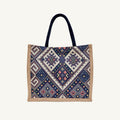 Bohemian geometric woven canvas tote bag in navy and natural, front view