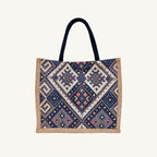 Bohemian geometric woven canvas tote bag in navy and natural, front view