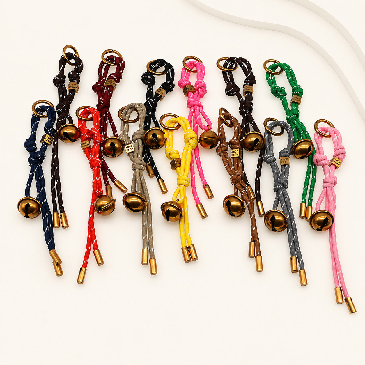 Assorted polyester rope bell bag charms