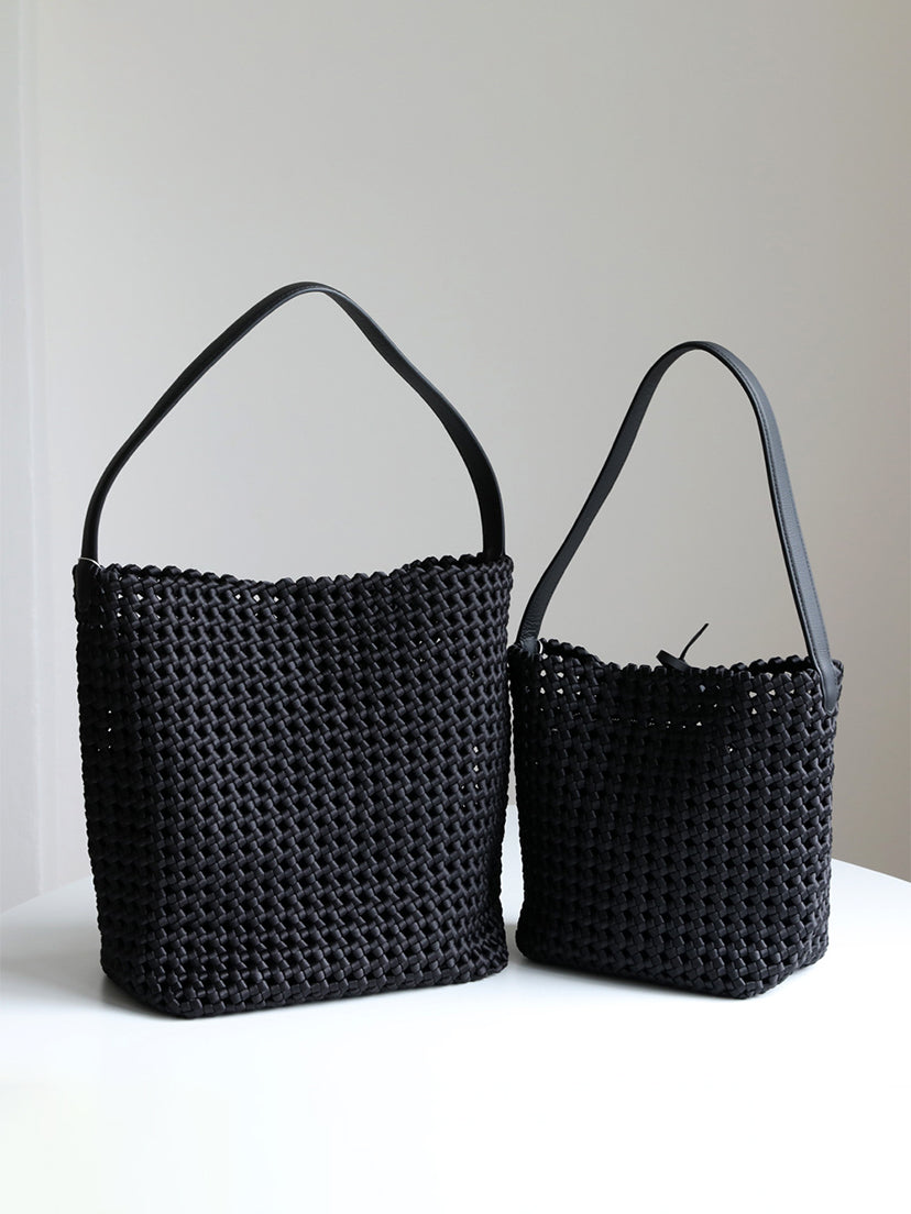 Sleek black genuine leather lattice woven everyday totes with premium rolled straps, available in small and large capacities.