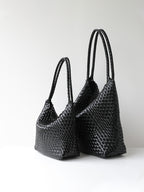 Black woven vegan leather tote bag shown in size options