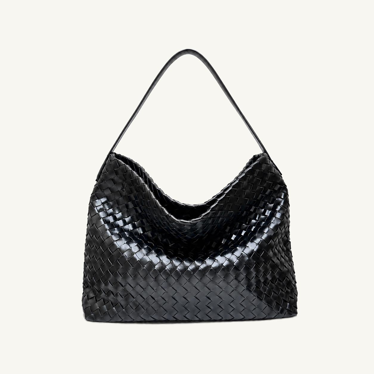 Front view of The Onyx black woven vegan leather slouchy tote bag