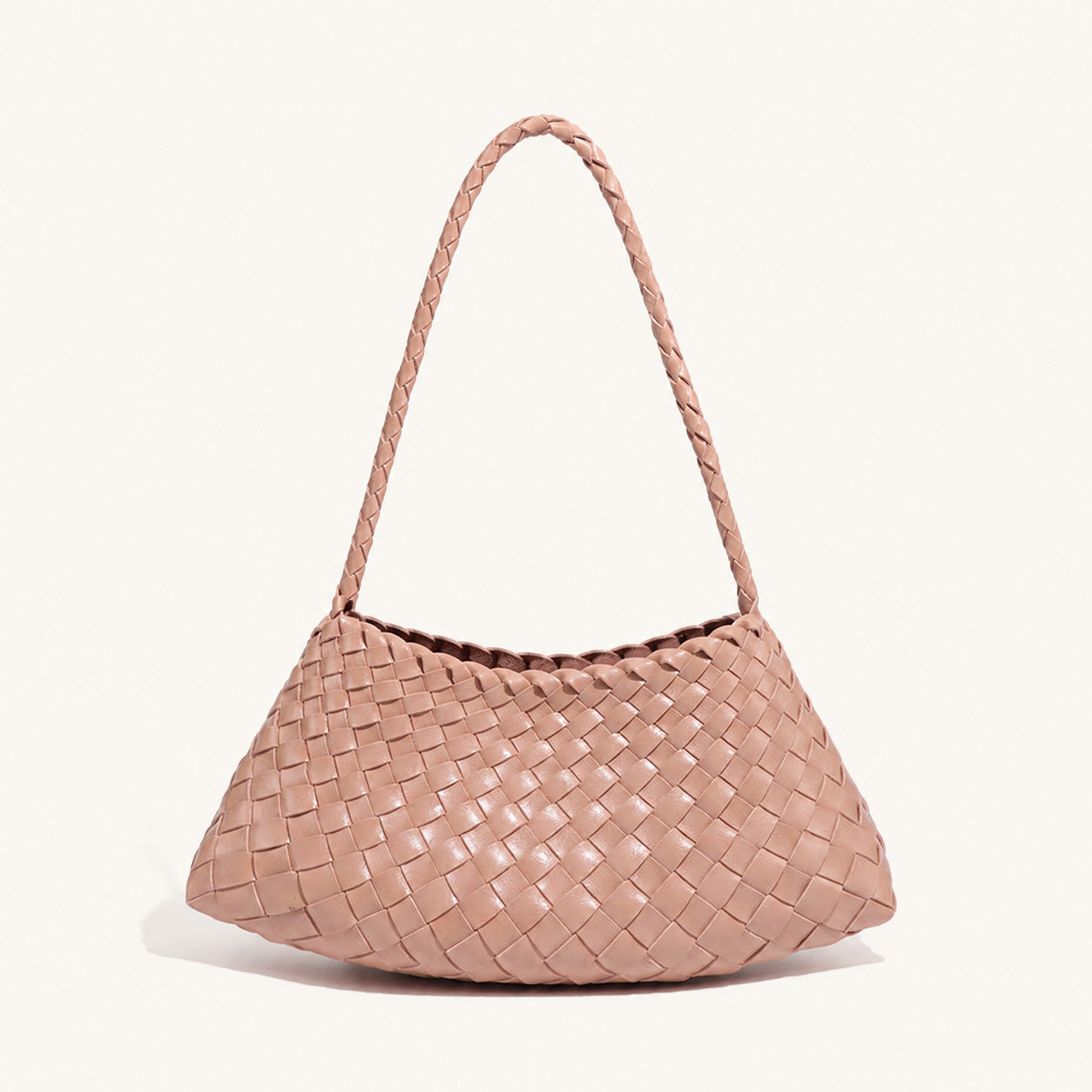 Blush pink woven vegan leather shoulder bag with soft structured shape