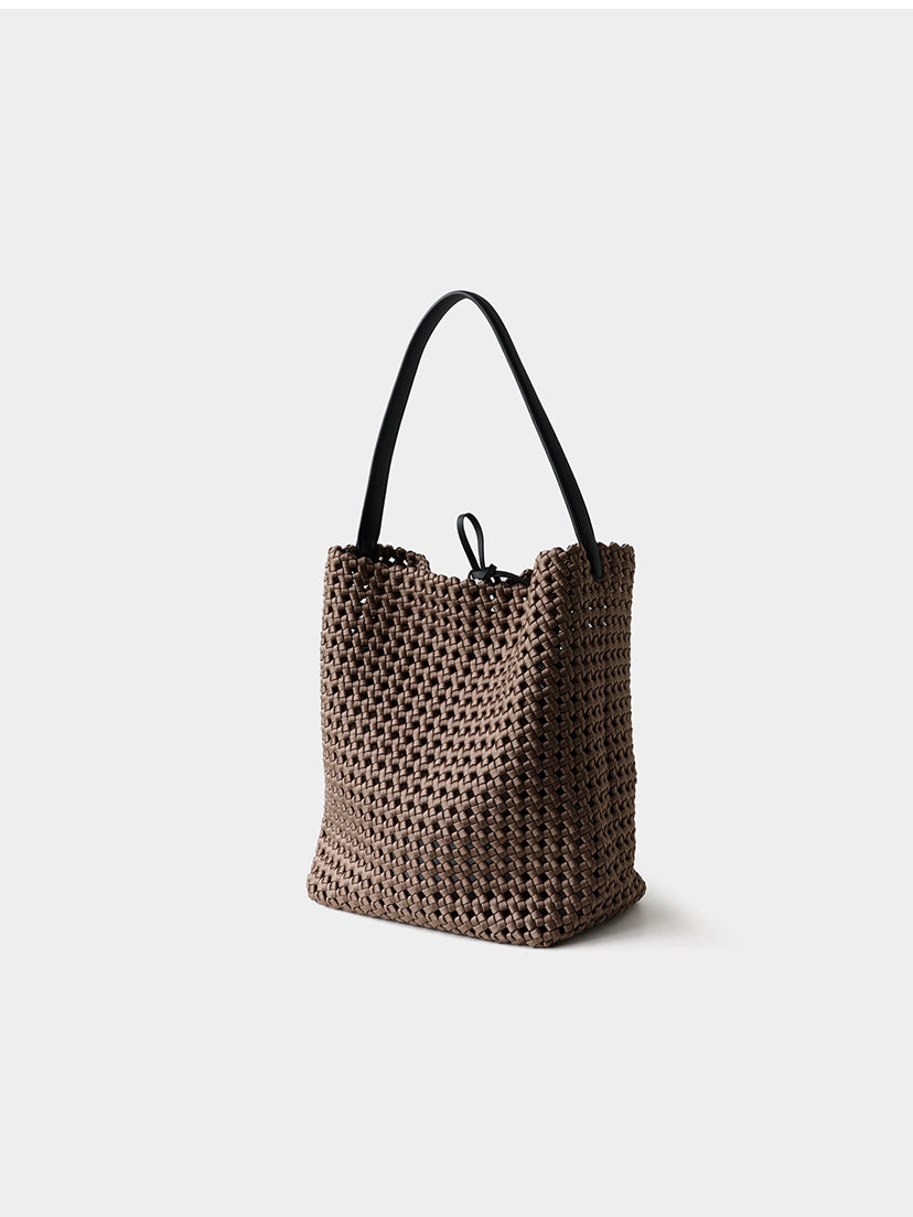 Front view of the brown genuine leather lattice woven shoulder bag, showcasing its elegant structured yet slouchy silhouette.