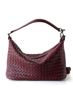 Burgundy red genuine leather woven handbag