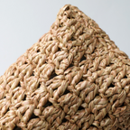 Close-up texture of the chunky natural woven raffia material
