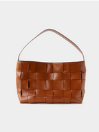 Clean front view of the classic brown genuine leather woven shoulder bag featuring a comfortable wide strap.
