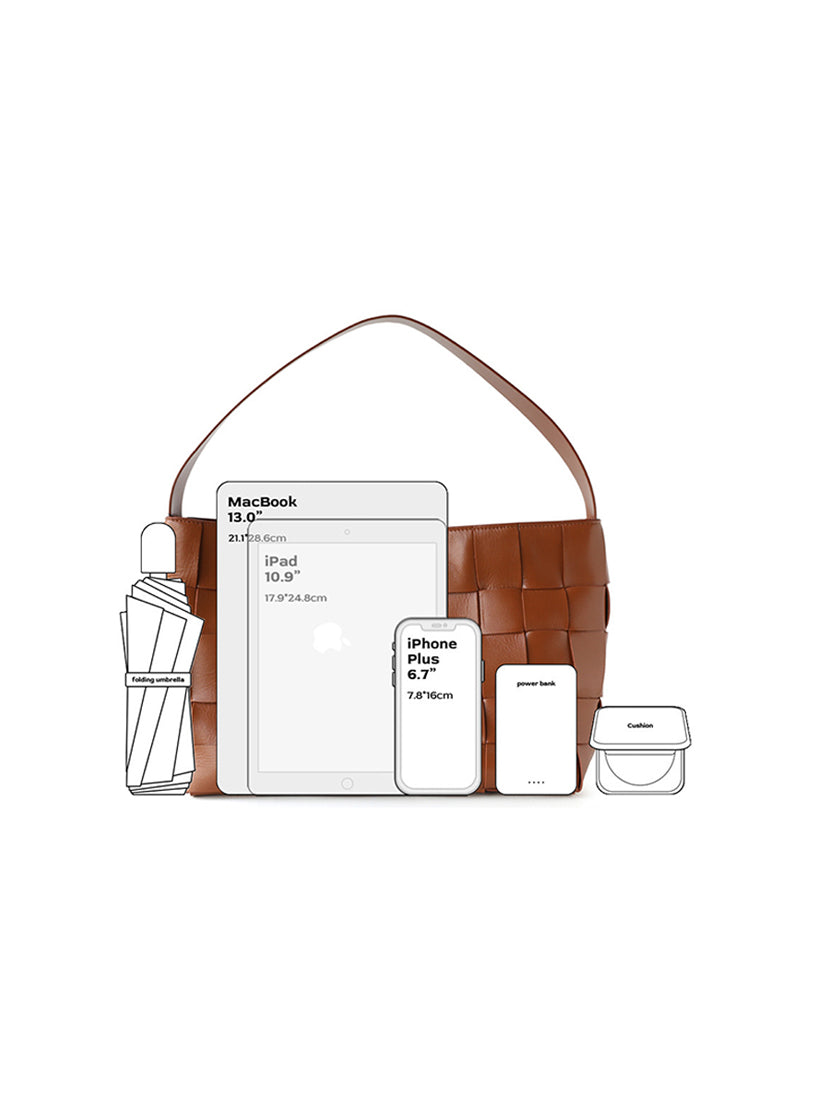 Visual capacity guide for the genuine leather woven tote bag, easily fitting a 13-inch MacBook, iPad, and daily essentials for work.