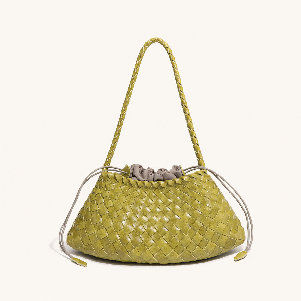 Lemon yellow woven vegan leather shoulder bag with soft curved silhouette