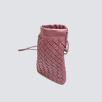 Angled view showing the easily accessible top opening of the woven cell phone purse