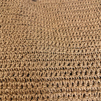 Macro detail of the eco-friendly woven paper straw raffia texture