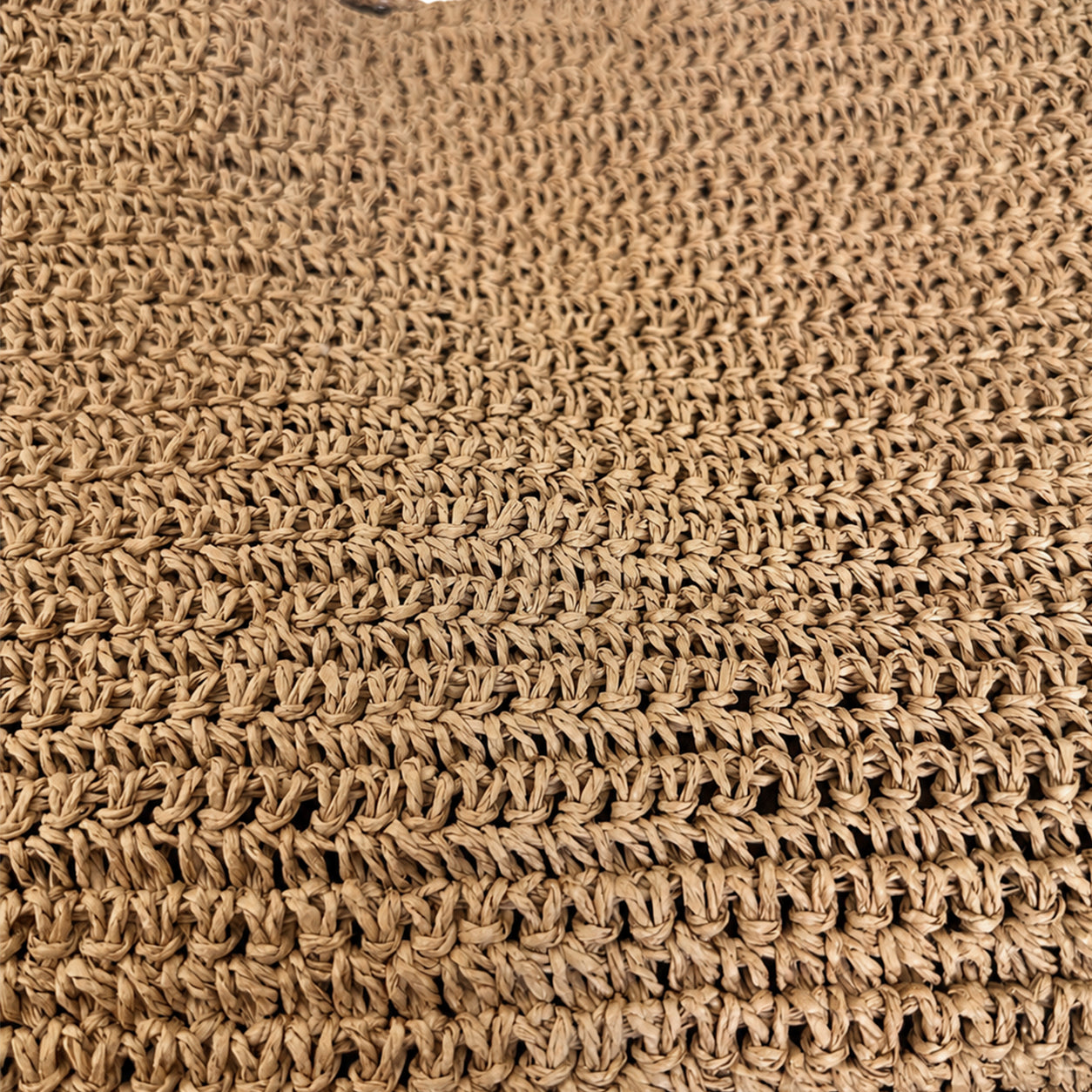 Macro detail of the eco-friendly woven paper straw raffia texture