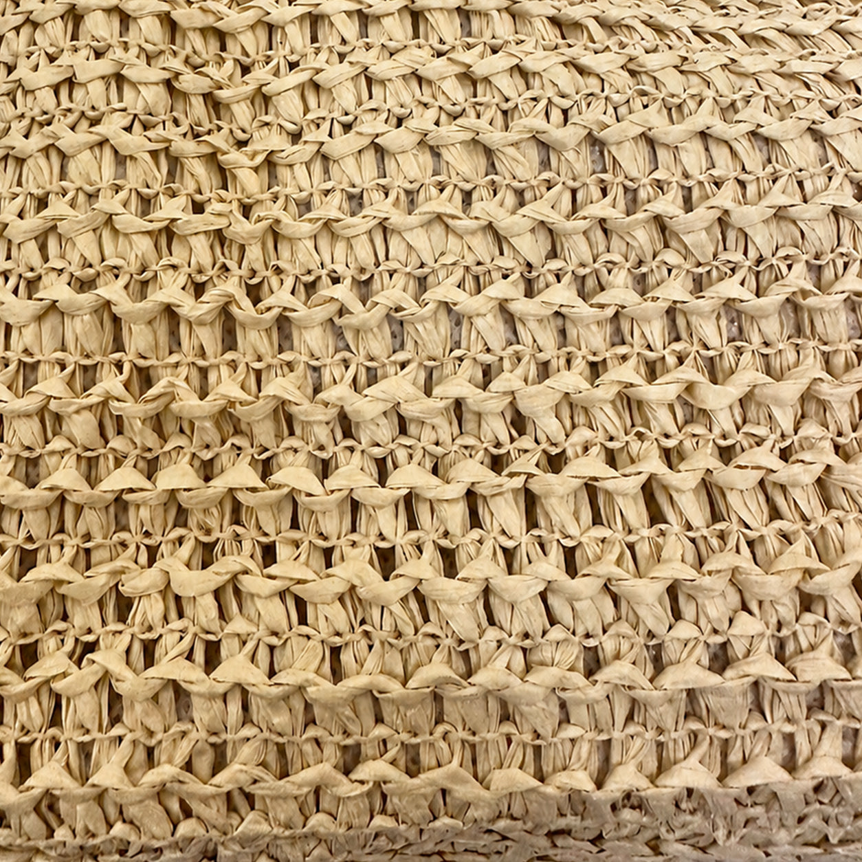 Macro detail of the eco-friendly woven paper straw raffia texture