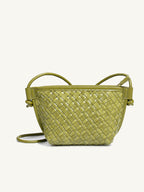 Front view of the olive green woven vegan leather mini crossbody bag, featuring chic knotted strap details and a stylish crescent silhouette.