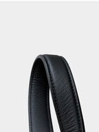 Close-up of the sturdy, comfortable rolled genuine leather shoulder strap on the black woven handbag.