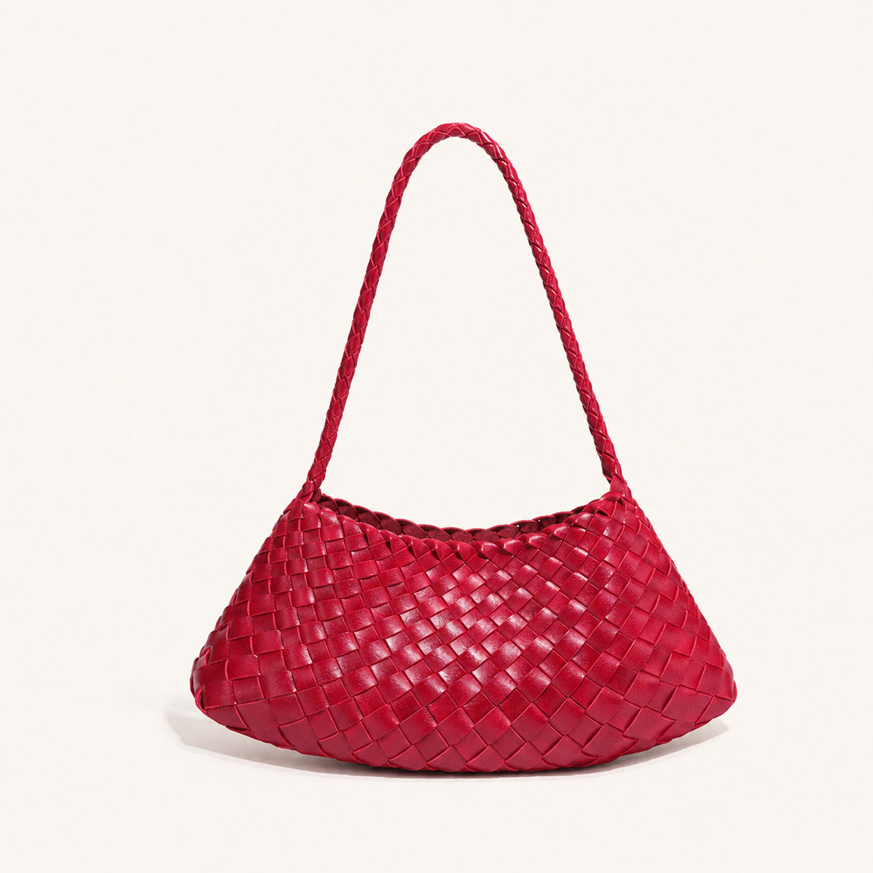Red woven vegan leather shoulder bag with soft structured body