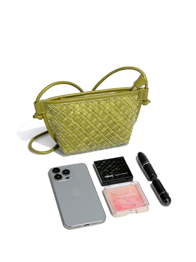 Capacity guide for the small woven vegan leather crossbody bag, perfectly fitting a smartphone, lipstick, powder, and daily makeup essentials.