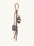 Tan vegan leather beaded tassel bag charm with braided cord and decorative beads