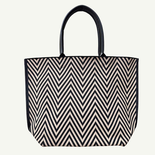 Black and brown chevron knit tote bag with black handles, front view