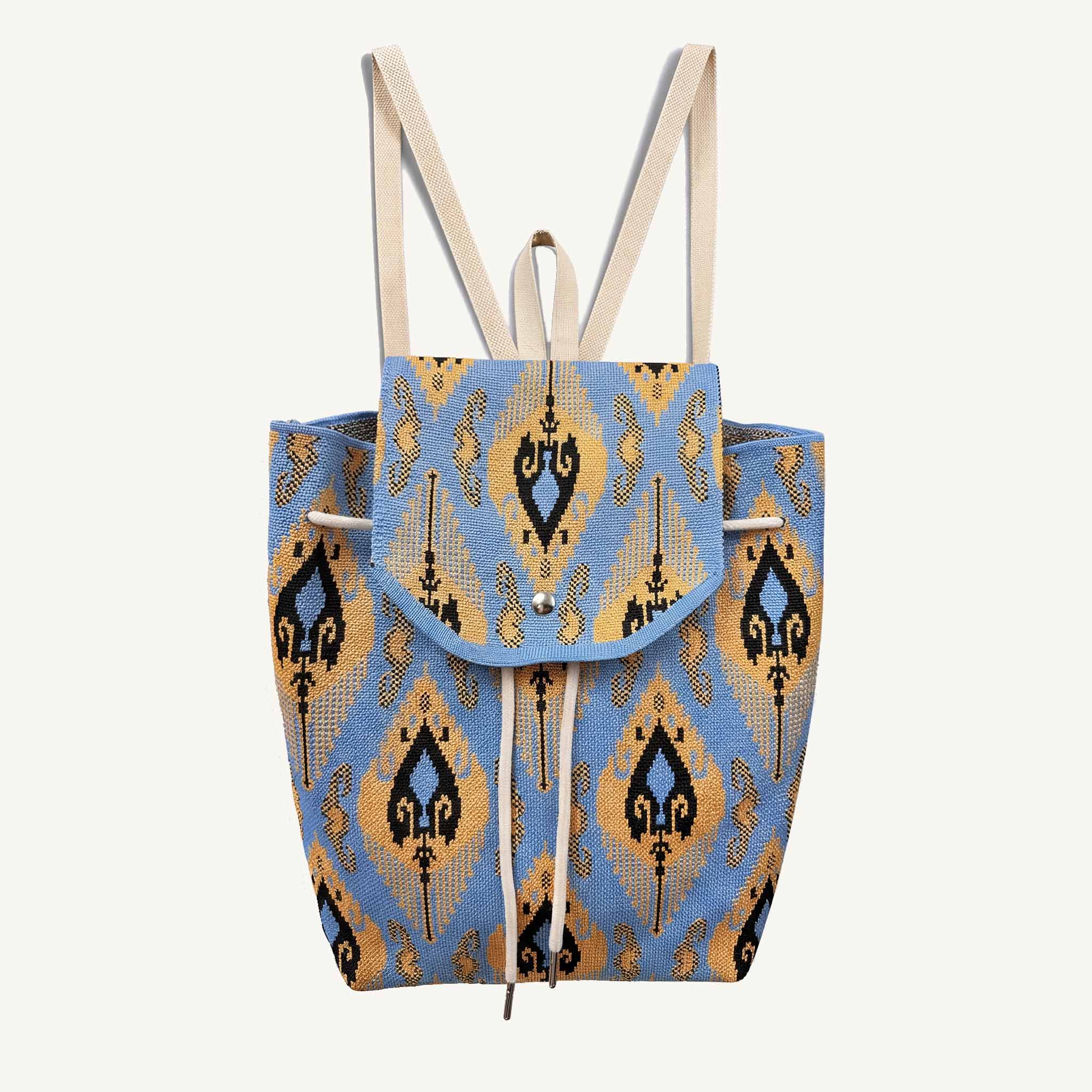 Blue and gold ikat knit backpack, front view