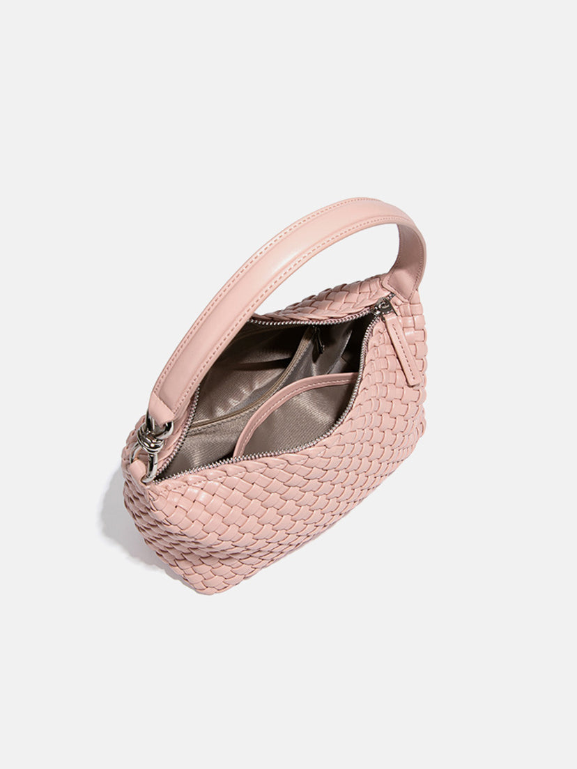 Blush pink woven vegan leather shoulder bag lined interior with zipper closure