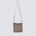 Brown patterned knit crossbody bag with an adjustable strap on a simple product background