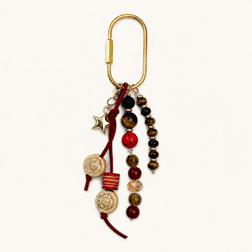 Burgundy and tigereye bead bag charm with gold star charm and ceramic beads