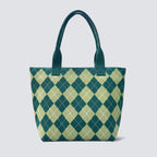 Green argyle knit tote bag with matching handles on a simple product background