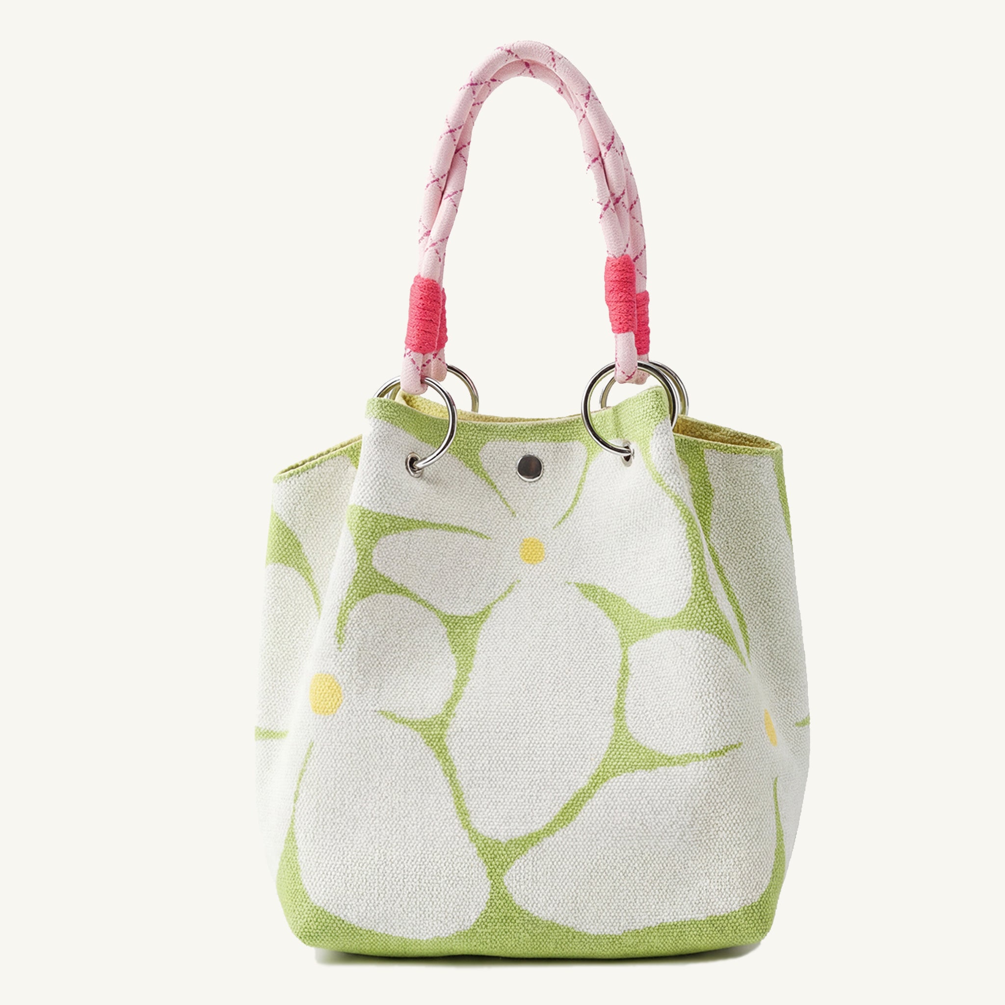 Light green patterned knit mini tote bag with pink handles, front view