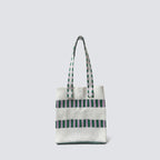 Green and white grid knit mini tote bag on a simple product background