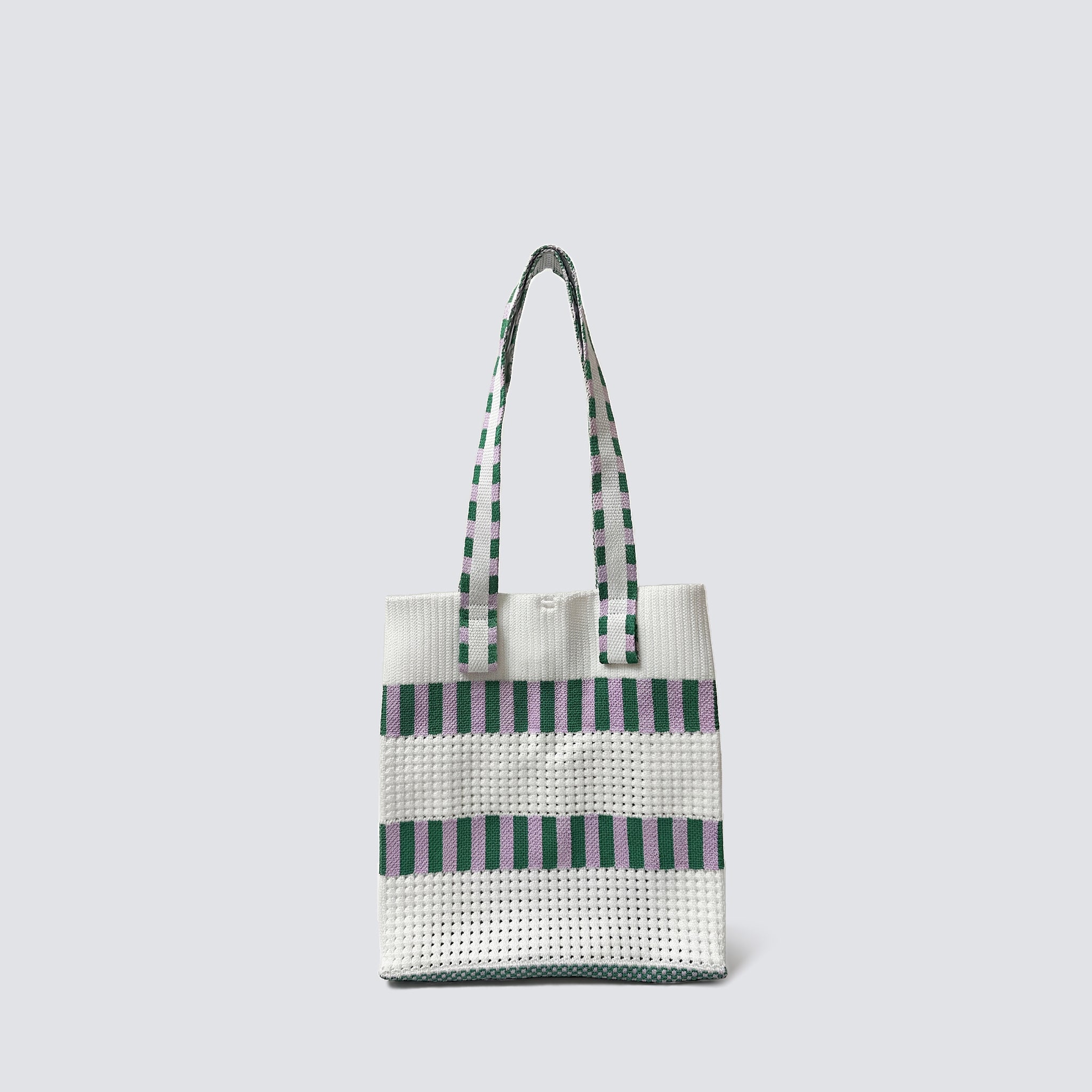 Green and white grid knit mini tote bag on a simple product background
