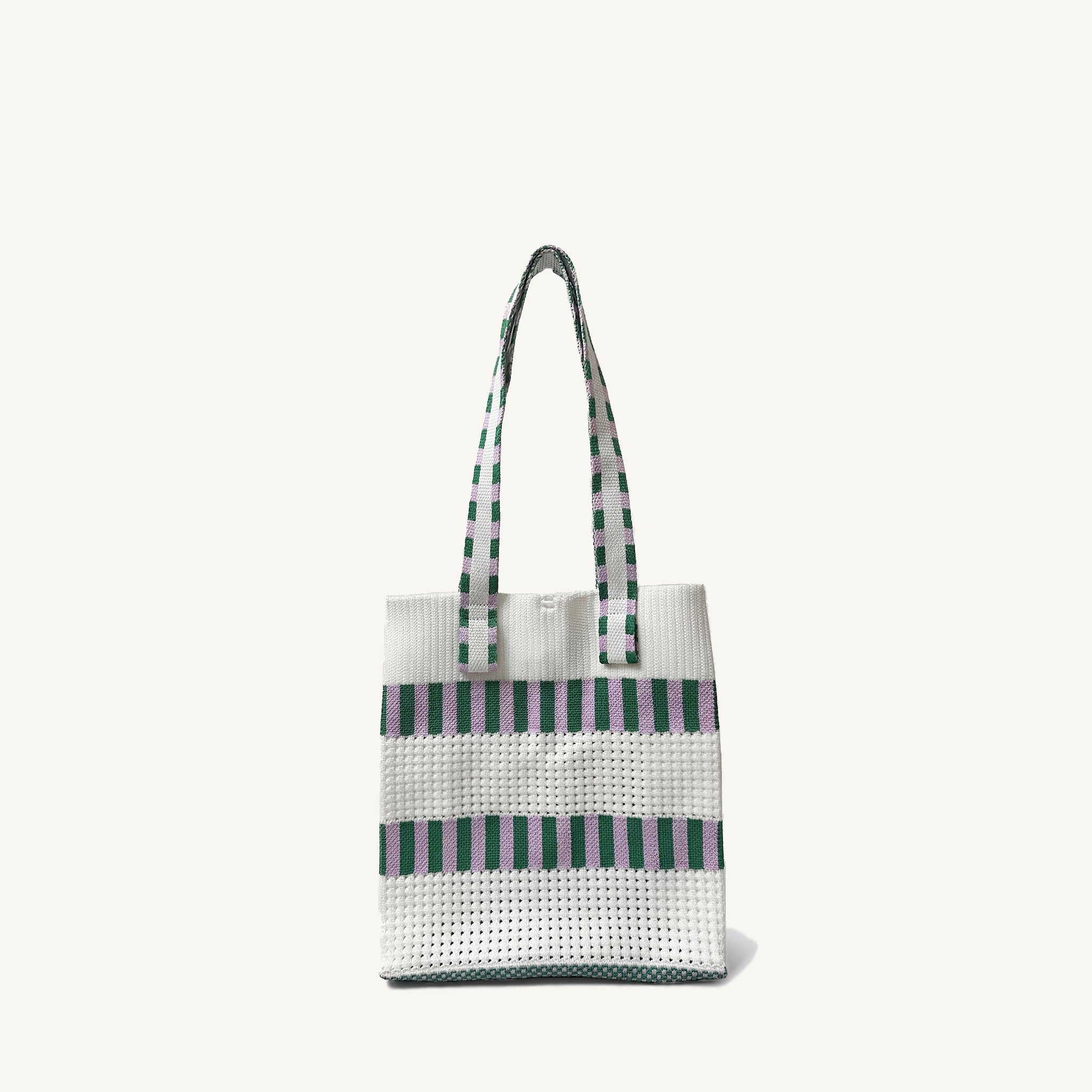 Green and white grid knit mini tote bag with double handles, front view