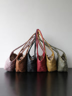 Handwoven genuine leather tote bag color options side view