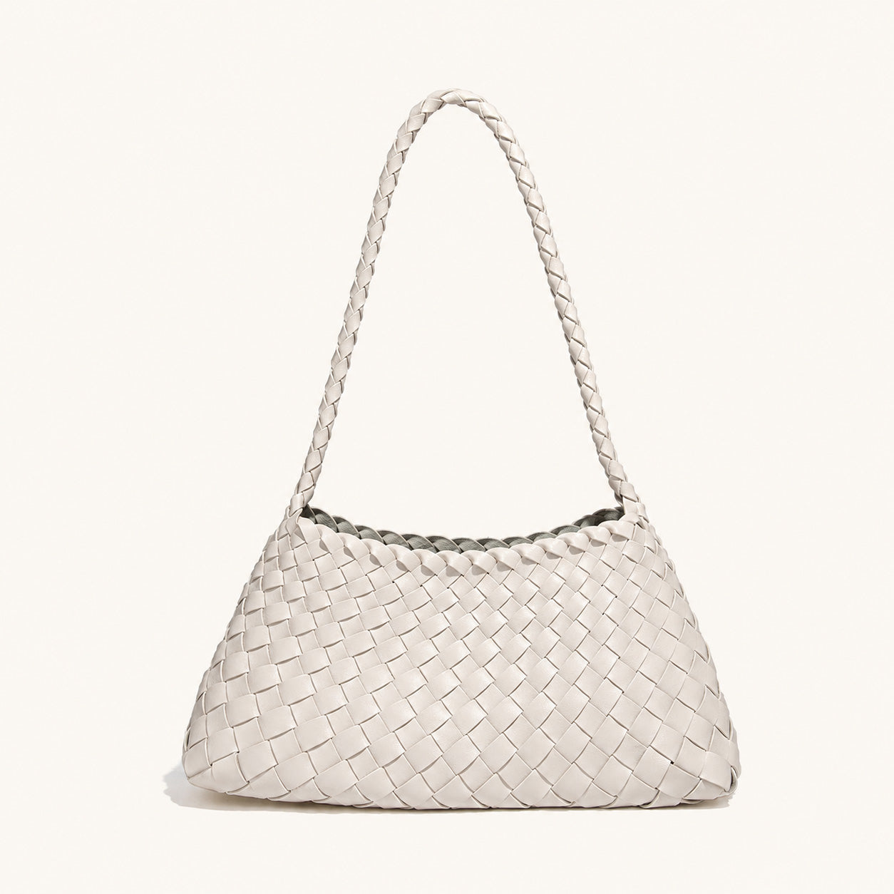 White woven vegan leather shoulder bag with clean curved silhouette
