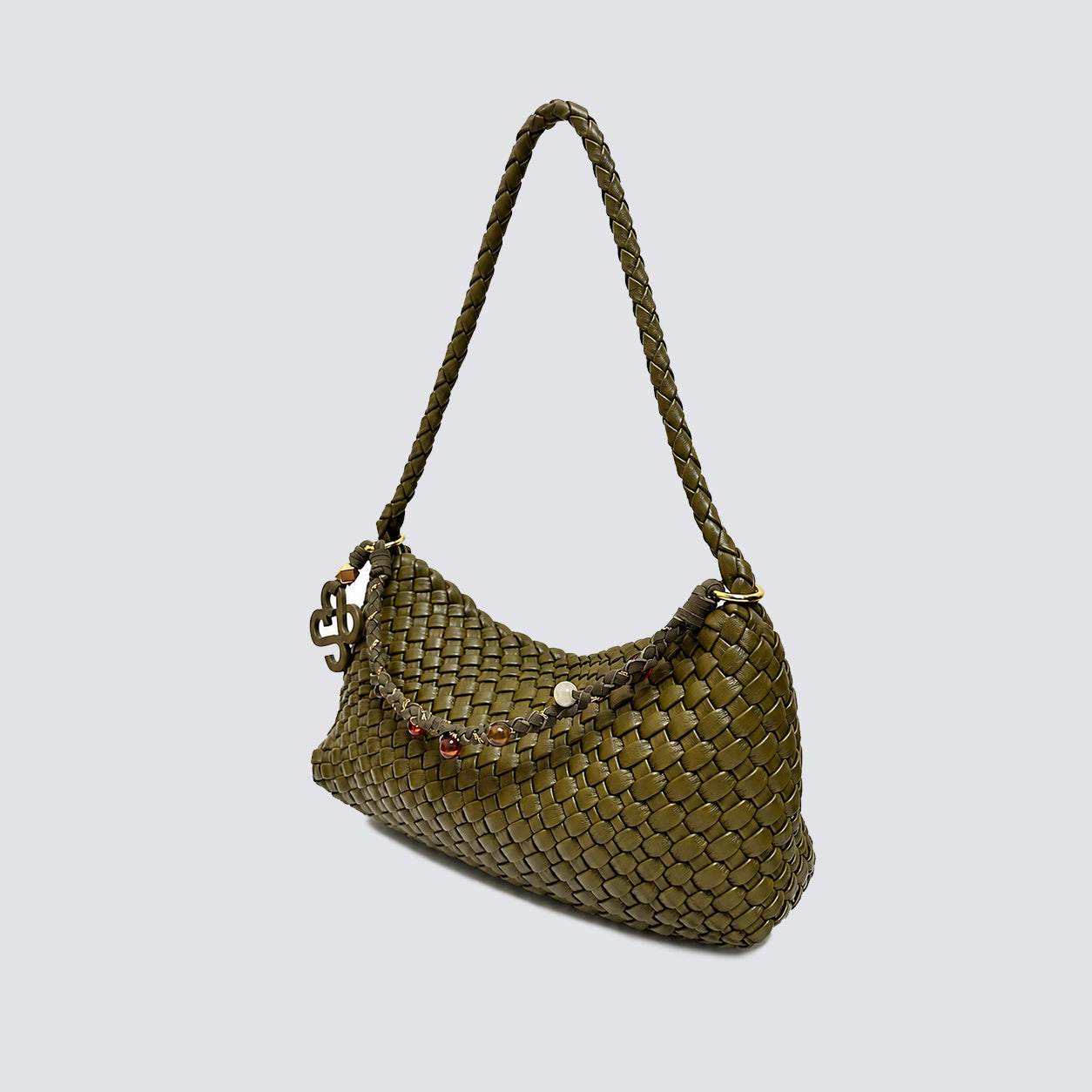 Angled view of the slouchy woven hobo bag showcasing its supple vegan leather texture