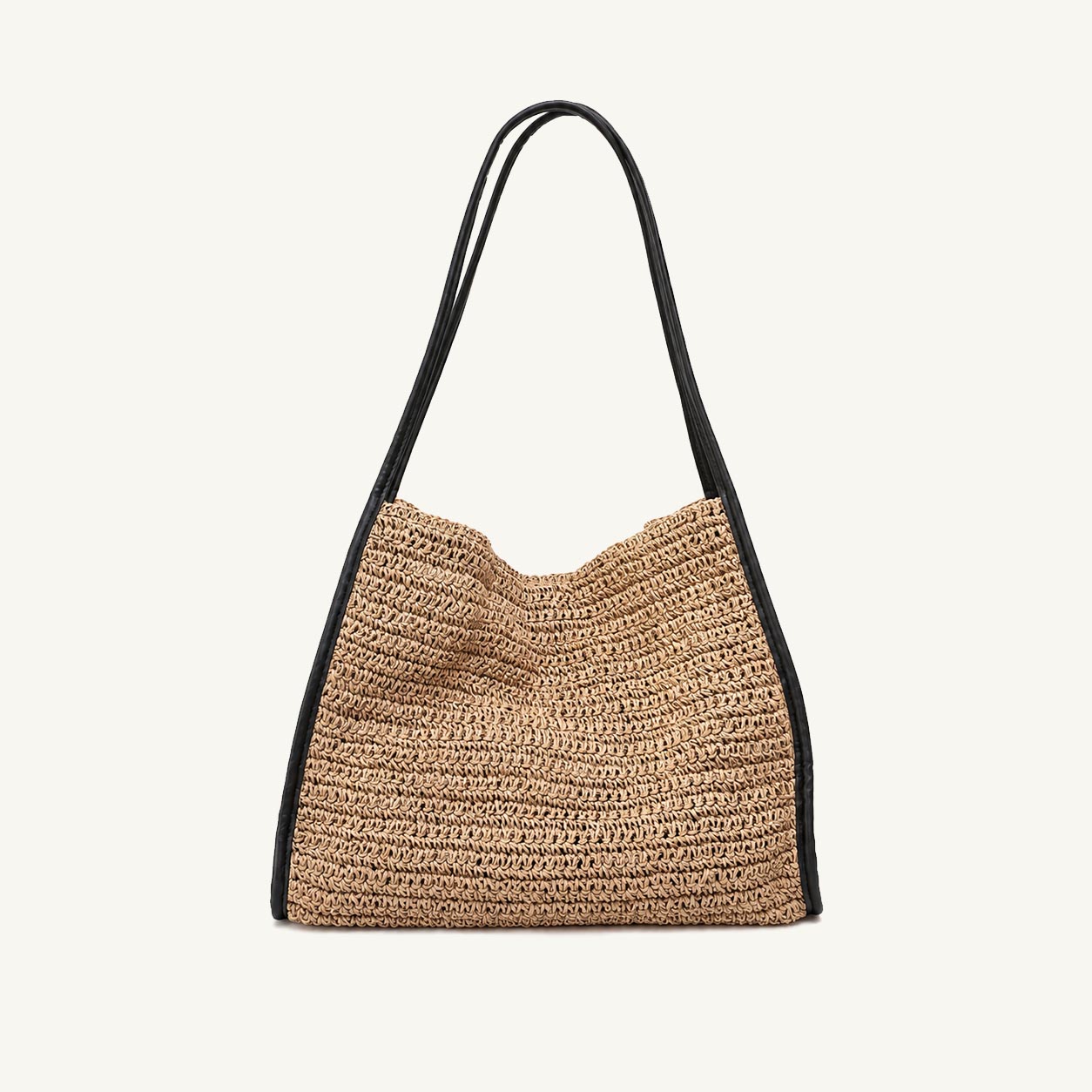 Woven paper straw tote bag with black trim and handles, front view