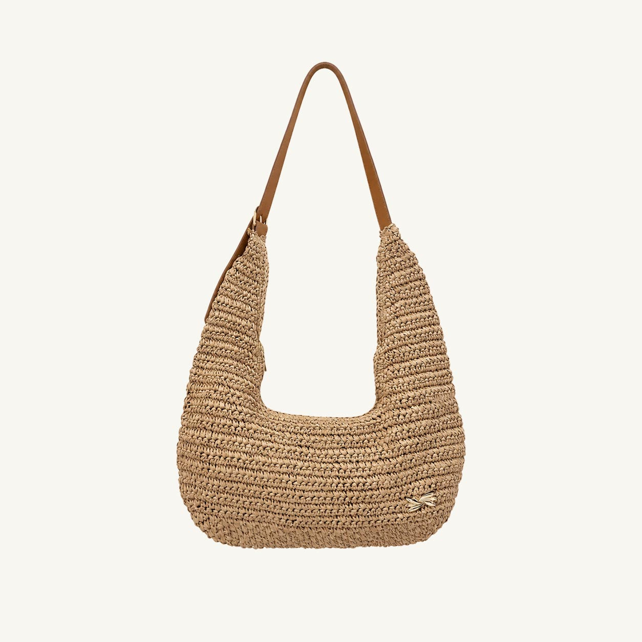 Natural woven straw hobo shoulder bag with adjustable brown strap, front view