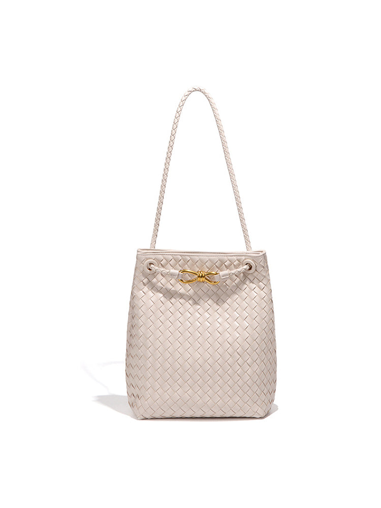 Ivory beige woven vegan leather bucket bag with braided strap and polished gold-tone accent