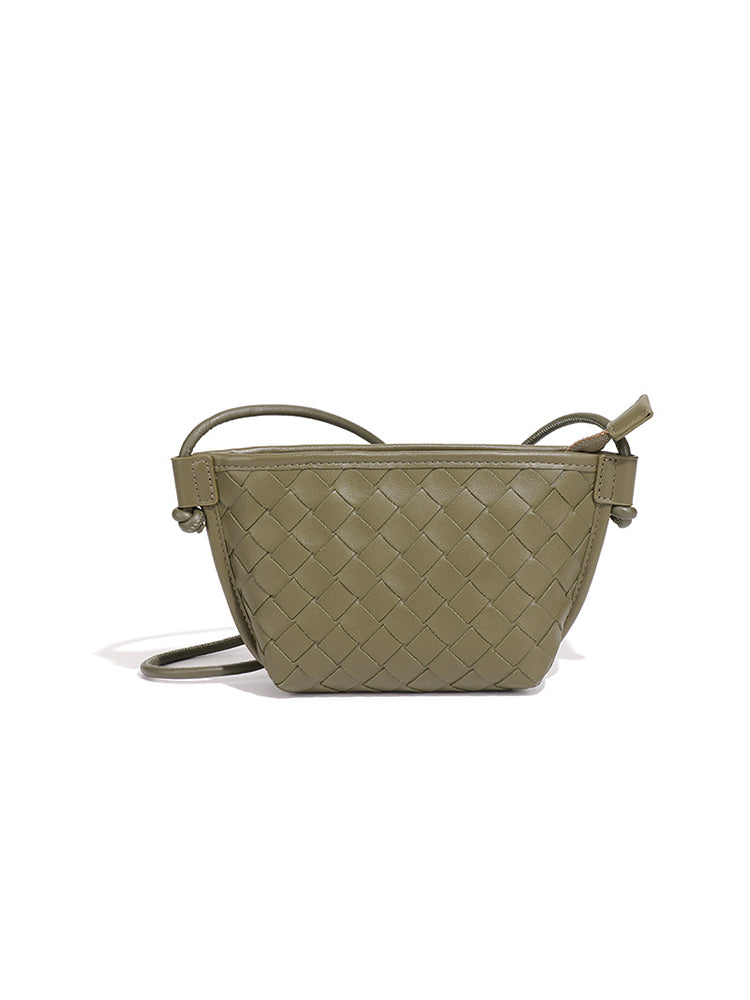 Olive green woven vegan leather crossbody bag with compact shape and shoulder strap
