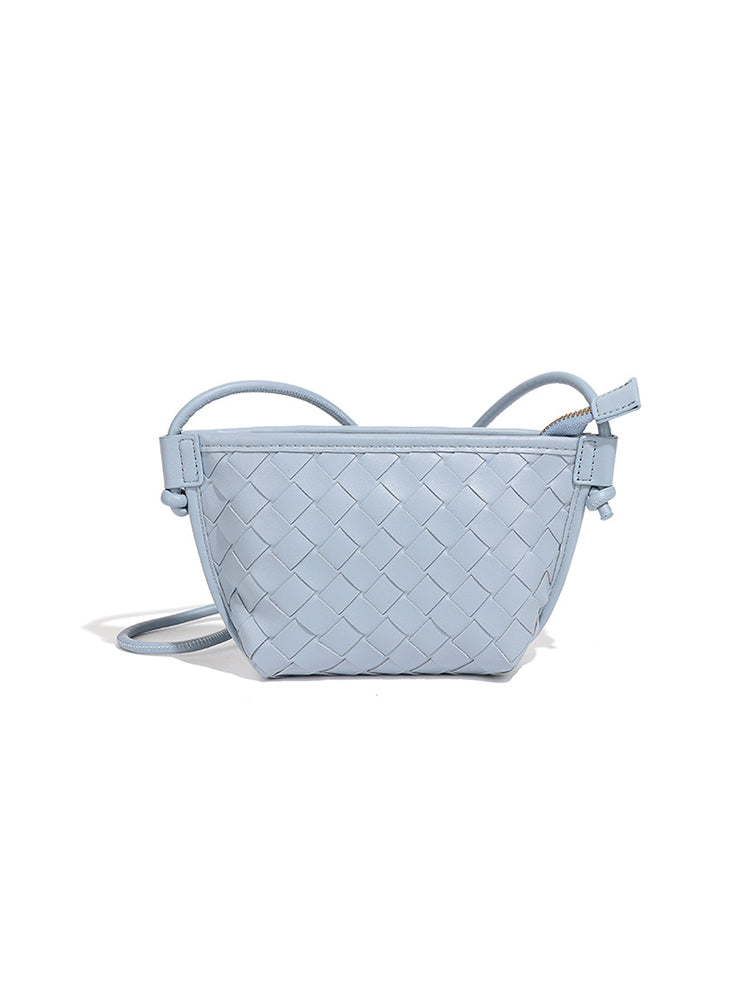 Powder blue woven vegan leather shoulder bag with compact crossbody silhouette