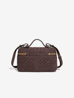 Back view of chocolate brown woven vegan leather top handle bag with woven texture and strap