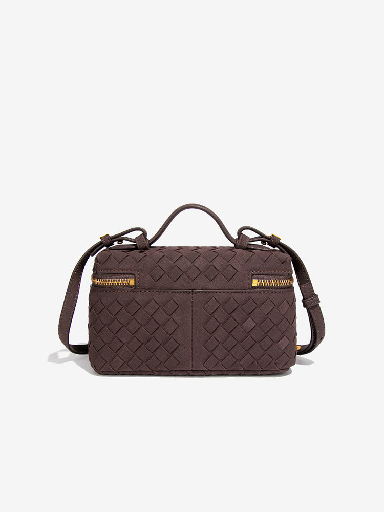 Back view of chocolate brown woven vegan leather top handle bag with woven texture and strap